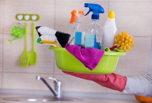 Carpet cleaner in W6 preparing equipment before a safe cleaning job
