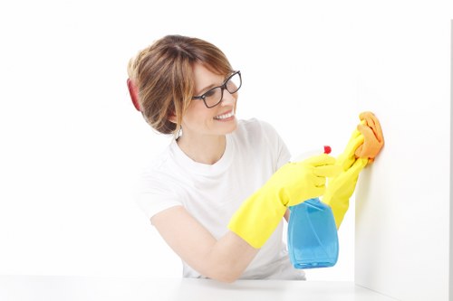 Local cleaners preparing a W6 flat for handover with access challenges